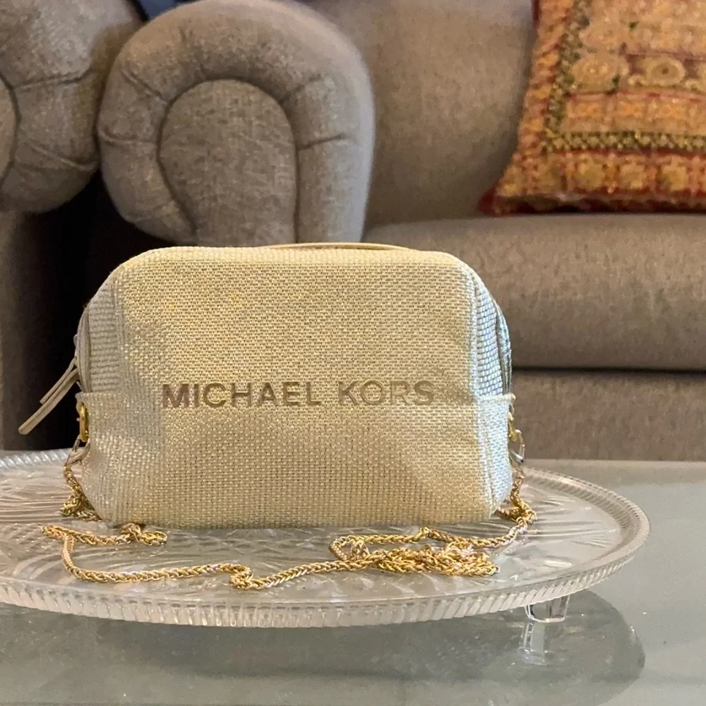 Michael Kors Shimmering Cream Gold Pouch with golden sling
